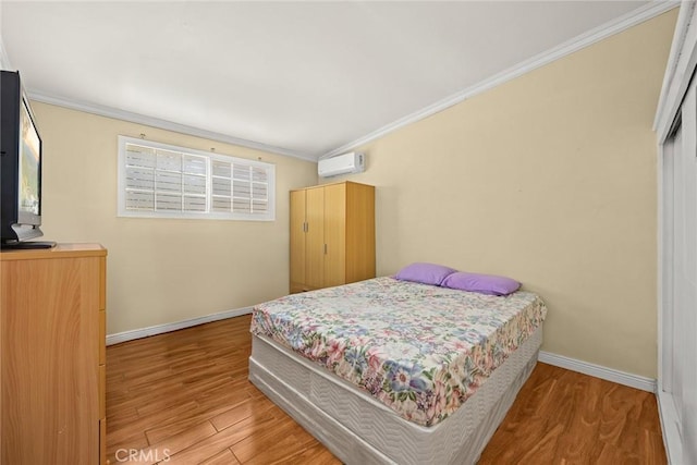 13162 Oaks Ave, Chino, CA 91710 - bedroom featuring a wall mounted AC, crown molding, and wood finished floors