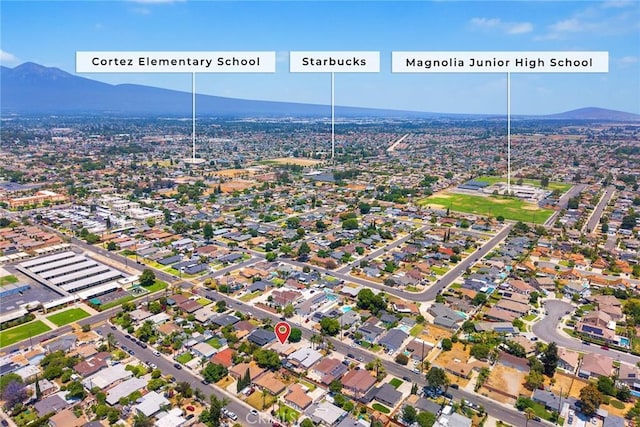 13162 Oaks Ave, Chino, CA 91710 - aerial overview of property's location with a mountain backdrop