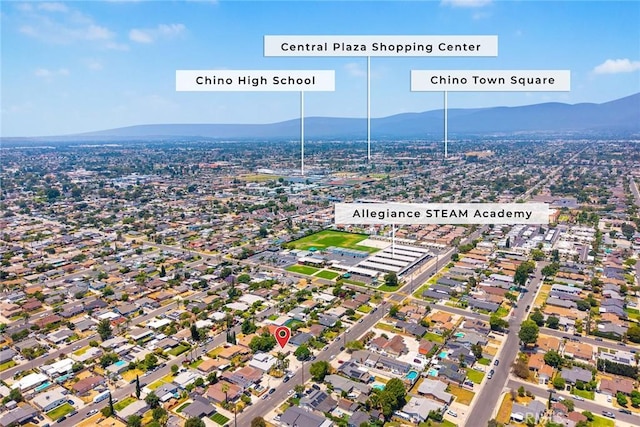 13162 Oaks Ave, Chino, CA 91710 - aerial view of property and surrounding area featuring a mountainous background