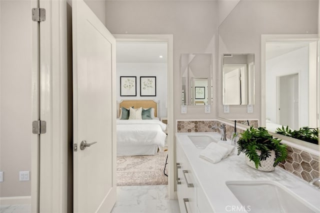 100 Soaring Eagle, Irvine, CA 92618 - ensuite bathroom featuring double vanity and marble look tiles