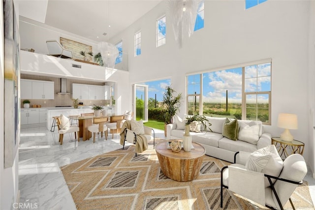 100 Soaring Eagle, Irvine, CA 92618 - living room featuring a high ceiling and light marble finish floors