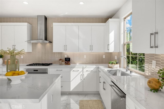 100 Soaring Eagle, Irvine, CA 92618 - kitchen with wall chimney exhaust hood, stainless steel appliances, light marble finish flooring, light stone countertops, and white cabinets