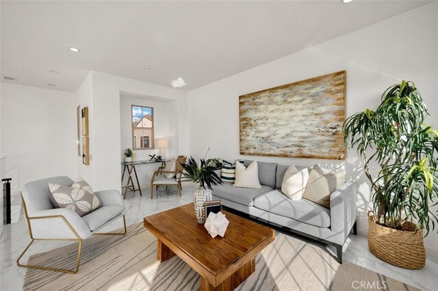 100 Soaring Eagle, Irvine, CA 92618 - living area featuring recessed lighting and light marble finish floors
