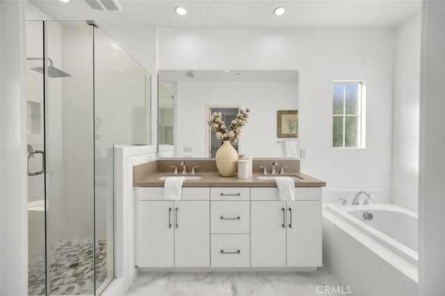 100 Soaring Eagle, Irvine, CA 92618 - full bathroom with a stall shower, double vanity, a bath, recessed lighting, and marble look tile flooring