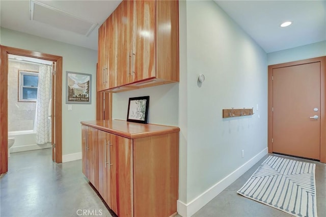 3163 Inclinado, San Clemente, CA 92673 - hallway featuring attic access, finished concrete floors, and recessed lighting