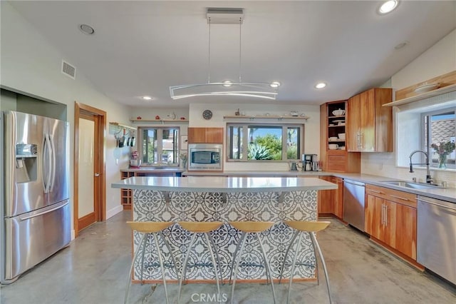 3163 Inclinado, San Clemente, CA 92673 - kitchen featuring stainless steel appliances, concrete flooring, light countertops, recessed lighting, and healthy amount of natural light