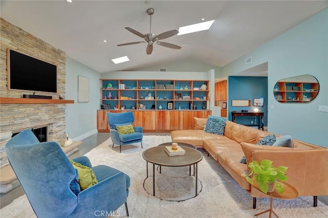 3163 Inclinado, San Clemente, CA 92673 - living area featuring a ceiling fan, a skylight, vaulted ceiling, and a fireplace