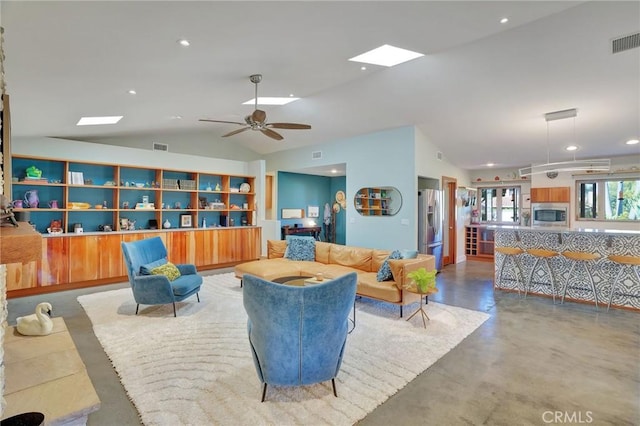 3163 Inclinado, San Clemente, CA 92673 - living room with vaulted ceiling, concrete flooring, recessed lighting, ceiling fan, and a skylight