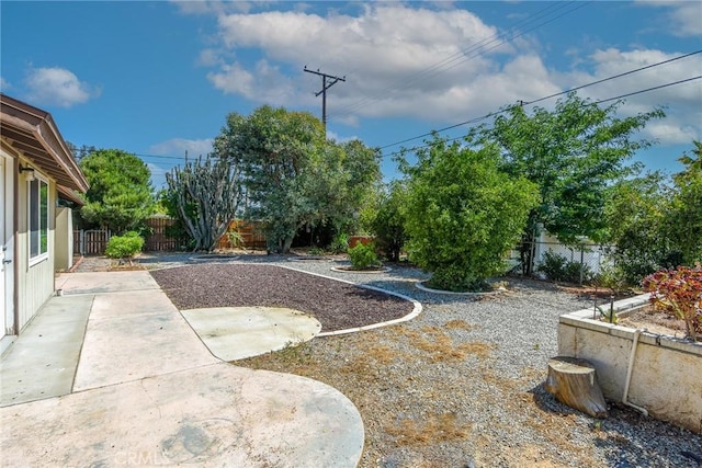 25981 Coombe Hill Dr, Menifee, CA 92586 - fenced backyard with a patio