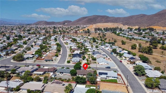 25981 Coombe Hill Dr, Menifee, CA 92586 - aerial perspective of suburban area with a mountain backdrop