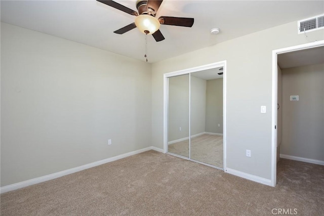 25981 Coombe Hill Dr, Menifee, CA 92586 - unfurnished bedroom featuring carpet flooring, a closet, and ceiling fan
