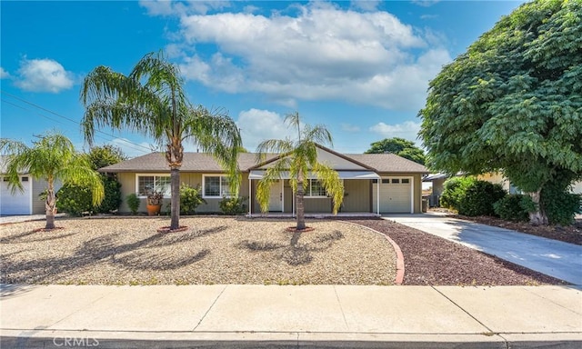 25981 Coombe Hill Dr, Menifee, CA 92586 - ranch-style house featuring concrete driveway and an attached garage