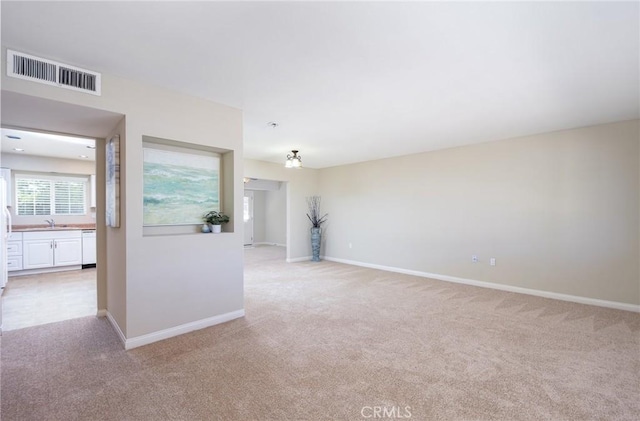 25981 Coombe Hill Dr, Menifee, CA 92586 - spare room featuring light carpet