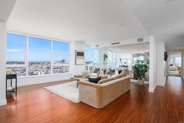 1325 Pacific Hwy Unit 3403, San Diego, CA 92101 - living room featuring wood finished floors, a view of city, and recessed lighting