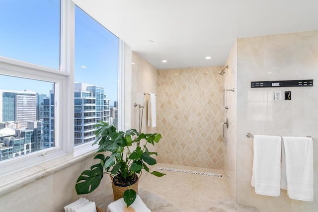 1325 Pacific Hwy Unit 3403, San Diego, CA 92101 - bathroom with a tile shower, a view of city, and tile patterned floors