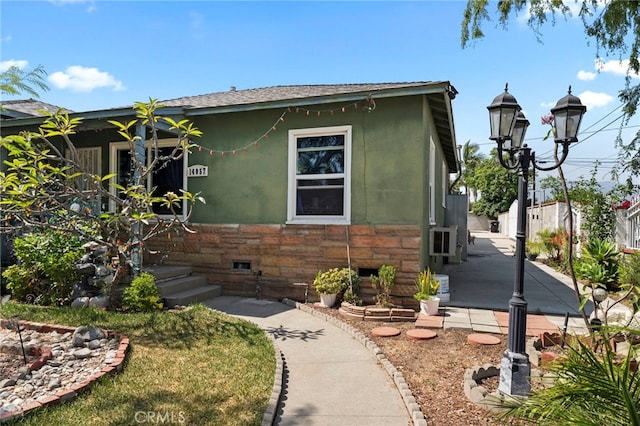 14057 Ohio St, Baldwin Park, CA 91706 - view of front of property with stucco siding and roof with shingles