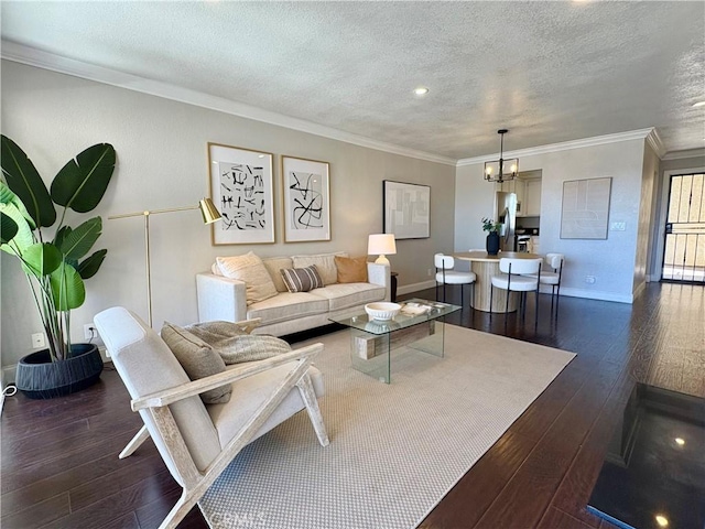 3845 Farquhar Ave Unit 212, Los Alamitos, CA 90720 - living area with a chandelier, dark wood-style flooring, a textured ceiling, crown molding, and recessed lighting