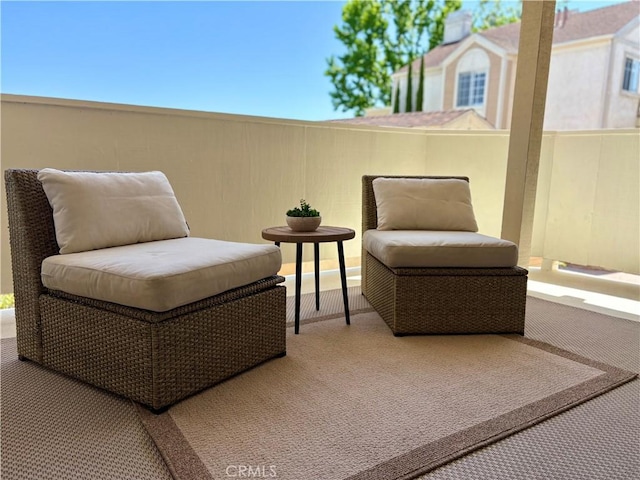 3845 Farquhar Ave Unit 212, Los Alamitos, CA 90720 - sitting room featuring carpet and plenty of natural light