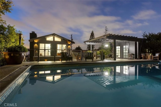 1012 10th St, Manhattan Beach, CA 90266 - outdoor pool featuring a pergola, french doors, an outdoor structure, an exterior structure, and a patio area