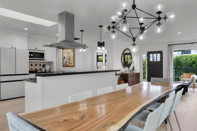 1012 10th St, Manhattan Beach, CA 90266 - dining area with recessed lighting and a chandelier