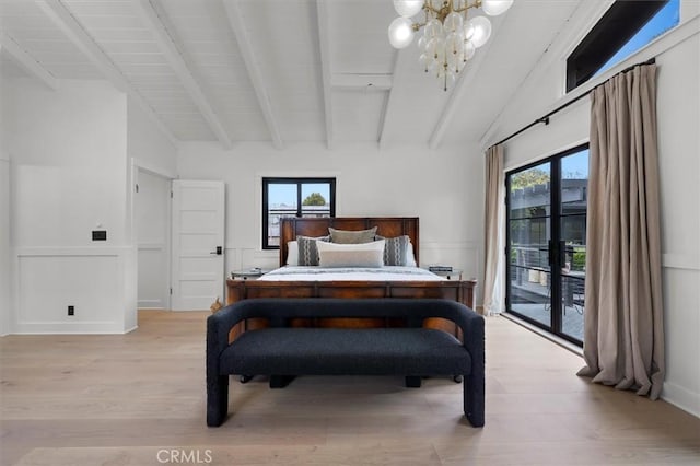 1012 10th St, Manhattan Beach, CA 90266 - bedroom with access to exterior, a chandelier, and light wood-type flooring