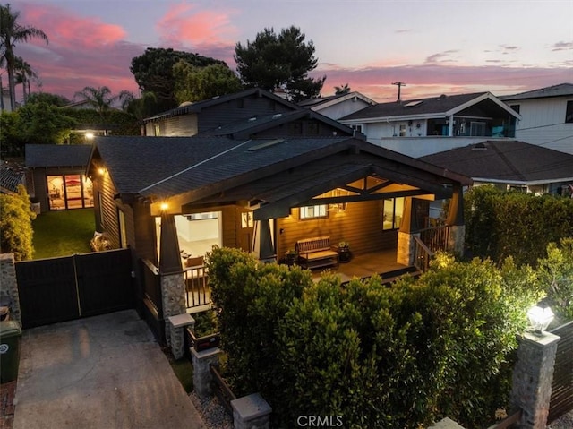 1012 10th St, Manhattan Beach, CA 90266 - view of front of house featuring a shingled roof and a porch