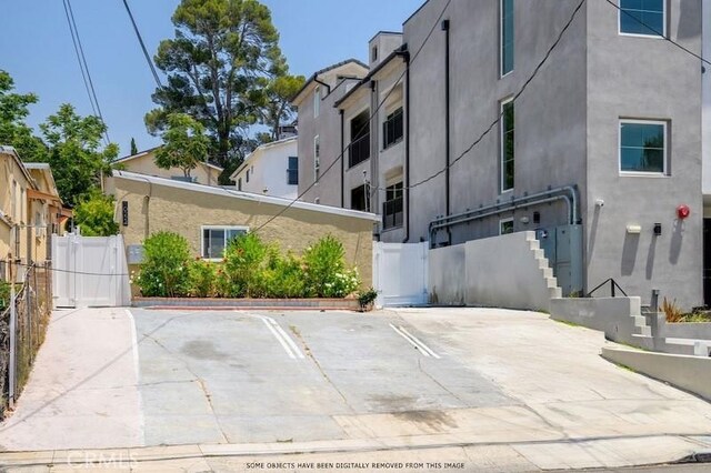 10224 Fernglen Ave, Tujunga, CA 91042 - view of property featuring uncovered parking