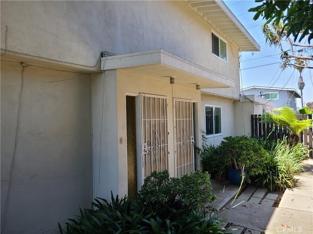 1548 N Elm Ave, Costa Mesa, CA 92626 - property entrance featuring stucco siding