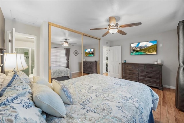 10270 Durango River Ct, Fountain Valley, CA 92708 - bedroom featuring wood finished floors, a closet, attic access, and ceiling fan