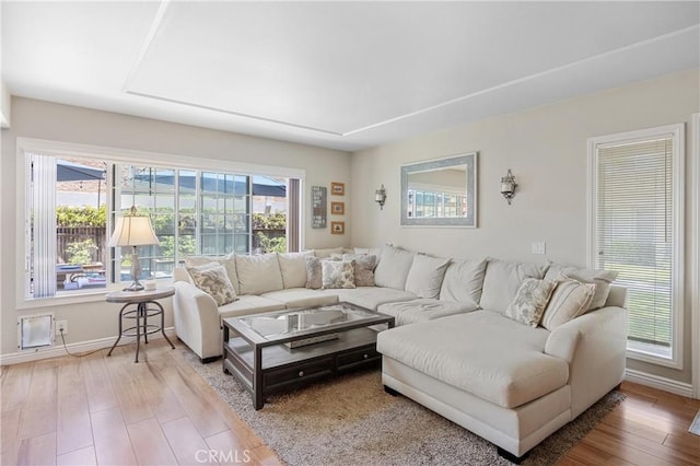 10270 Durango River Ct, Fountain Valley, CA 92708 - living room featuring wood finished floors and baseboards