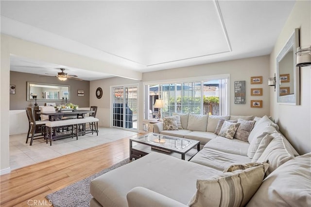 10270 Durango River Ct, Fountain Valley, CA 92708 - living room featuring light wood-style floors, healthy amount of natural light, and ceiling fan