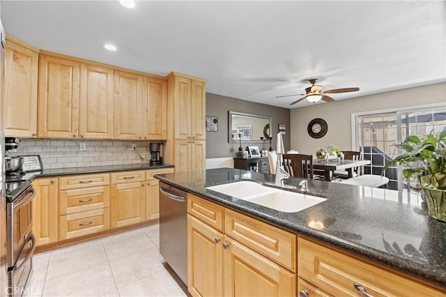 10270 Durango River Ct, Fountain Valley, CA 92708 - kitchen featuring appliances with stainless steel finishes, light brown cabinets, ceiling fan, backsplash, and light tile patterned flooring