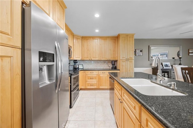 10270 Durango River Ct, Fountain Valley, CA 92708 - kitchen featuring appliances with stainless steel finishes, light brown cabinets, decorative backsplash, recessed lighting, and light tile patterned floors