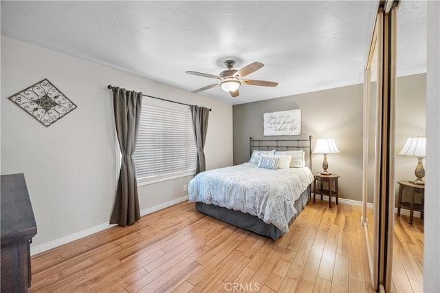 10270 Durango River Ct, Fountain Valley, CA 92708 - bedroom with light wood-style flooring and ceiling fan