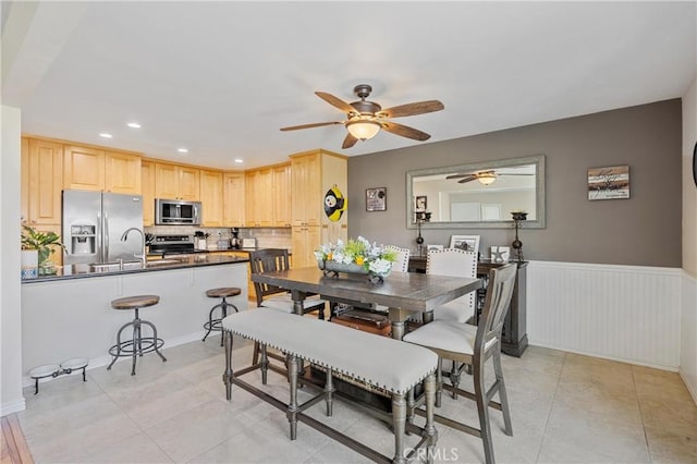 10270 Durango River Ct, Fountain Valley, CA 92708 - dining room with a ceiling fan, wainscoting, recessed lighting, and light tile patterned floors