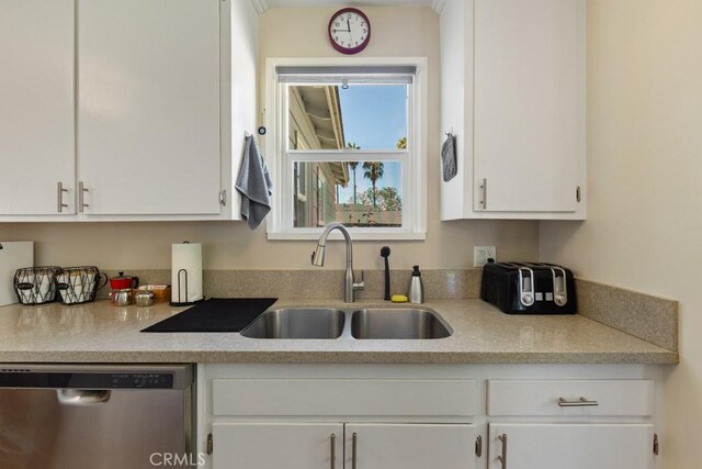 213 E 45th St, Long Beach, CA 90807 - kitchen with dishwasher, white cabinetry, and light countertops