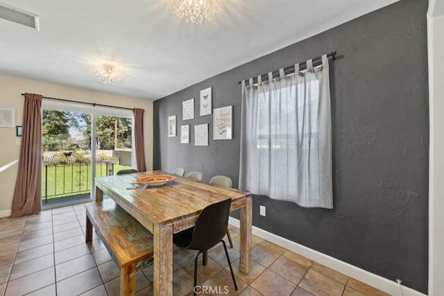 213 E 45th St, Long Beach, CA 90807 - dining room with tile patterned floors and a chandelier