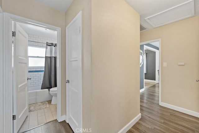 213 E 45th St, Long Beach, CA 90807 - corridor with wood finished floors and attic access