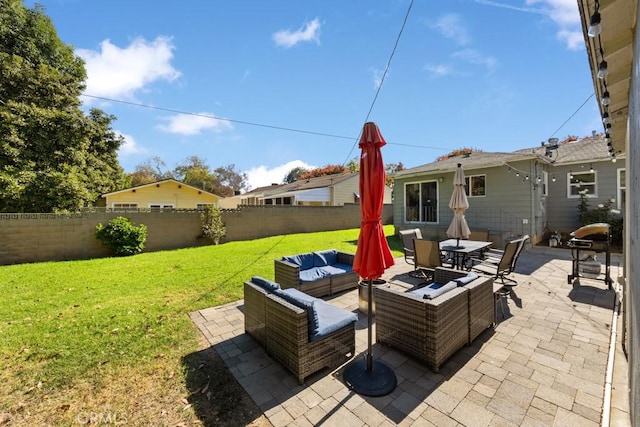 213 E 45th St, Long Beach, CA 90807 - fenced backyard featuring a patio area, an outdoor living space, and outdoor dining space