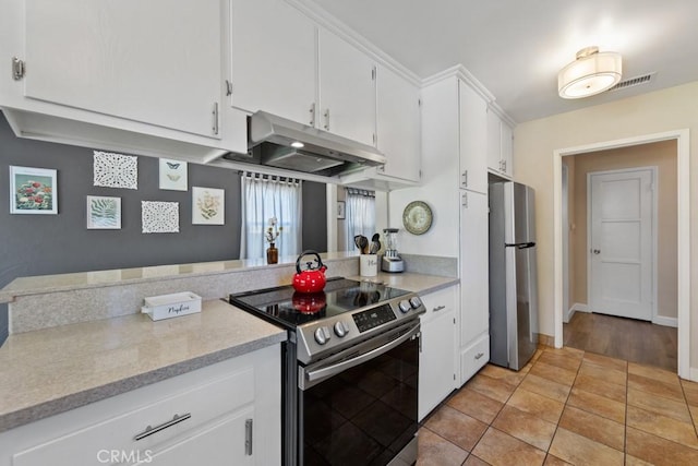 213 E 45th St, Long Beach, CA 90807 - kitchen with stainless steel appliances, under cabinet range hood, and white cabinetry