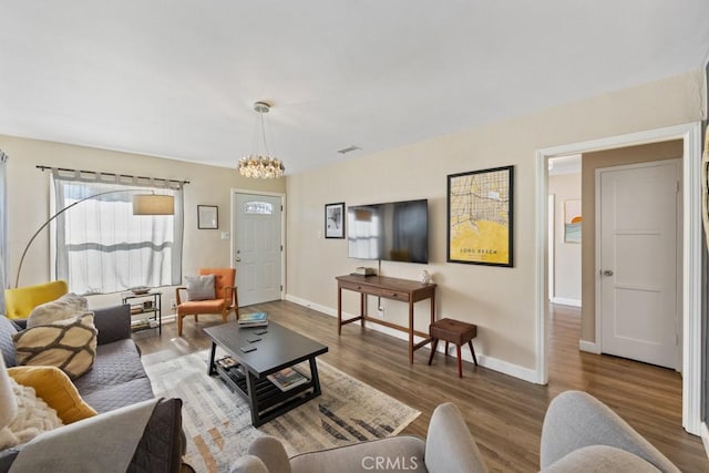 213 E 45th St, Long Beach, CA 90807 - living area with a chandelier and wood finished floors