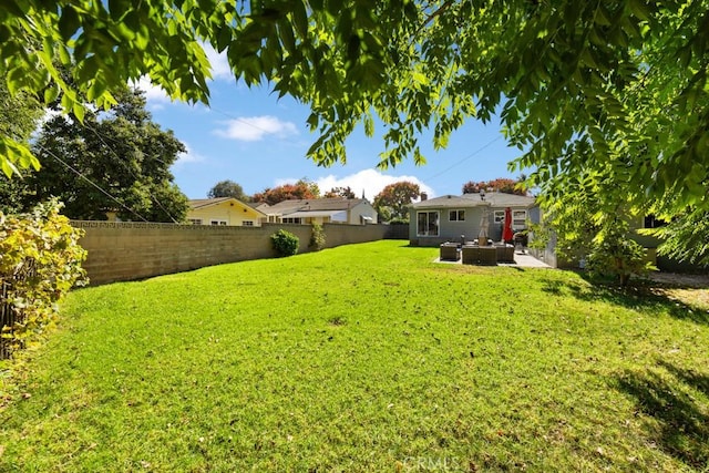 213 E 45th St, Long Beach, CA 90807 - fenced backyard with a patio area