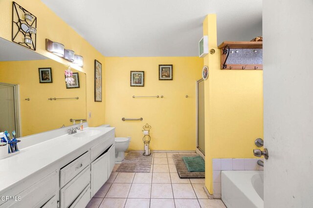 14134 Orizaba Ave, Paramount, CA 90723 - bathroom with vanity, a garden tub, tile patterned floors, and an enclosed shower