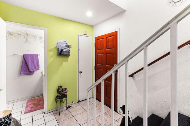 14134 Orizaba Ave, Paramount, CA 90723 - stairway with tile patterned floors and recessed lighting