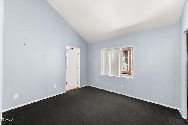 14134 Orizaba Ave, Paramount, CA 90723 - unfurnished room with vaulted ceiling and dark carpet