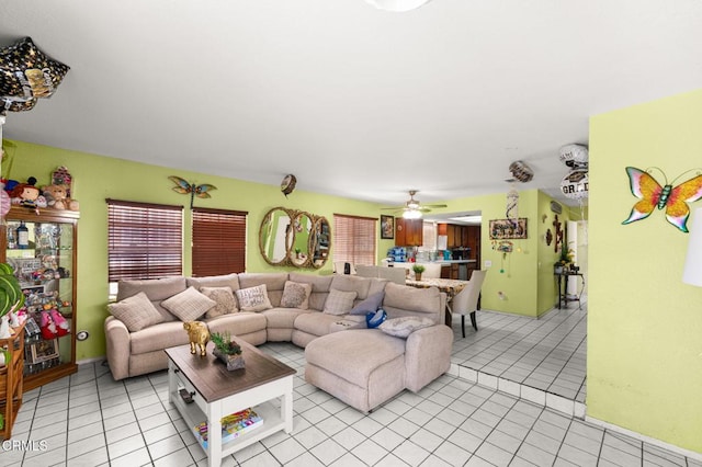 14134 Orizaba Ave, Paramount, CA 90723 - living room featuring light tile patterned flooring and a ceiling fan