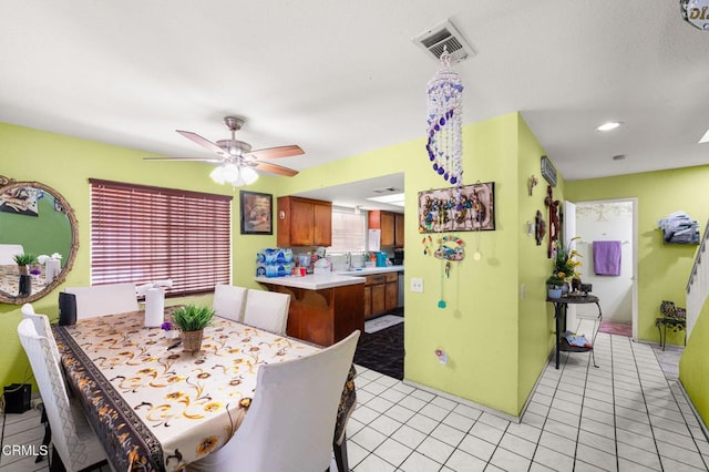 14134 Orizaba Ave, Paramount, CA 90723 - dining room featuring a ceiling fan, recessed lighting, and light tile patterned floors