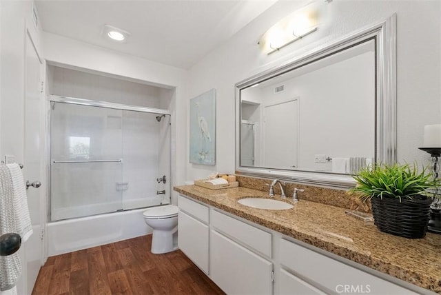 260 Cagney Ln Unit 206, Newport Beach, CA 92663 - bathroom with vanity, shower / bath combination with glass door, and wood finished floors