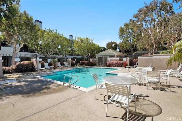 260 Cagney Ln Unit 206, Newport Beach, CA 92663 - community pool with a patio area