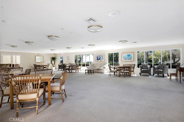 260 Cagney Ln Unit 206, Newport Beach, CA 92663 - dining space with light colored carpet and healthy amount of natural light